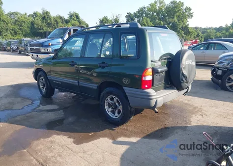 1999 Chevrolet Tracker from USA, damaged, VIN 2CNBJ13C9X6928226